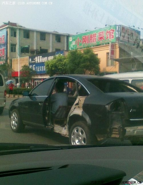 【图】奥迪A6超强装饰:木制手工座椅加透明左后门