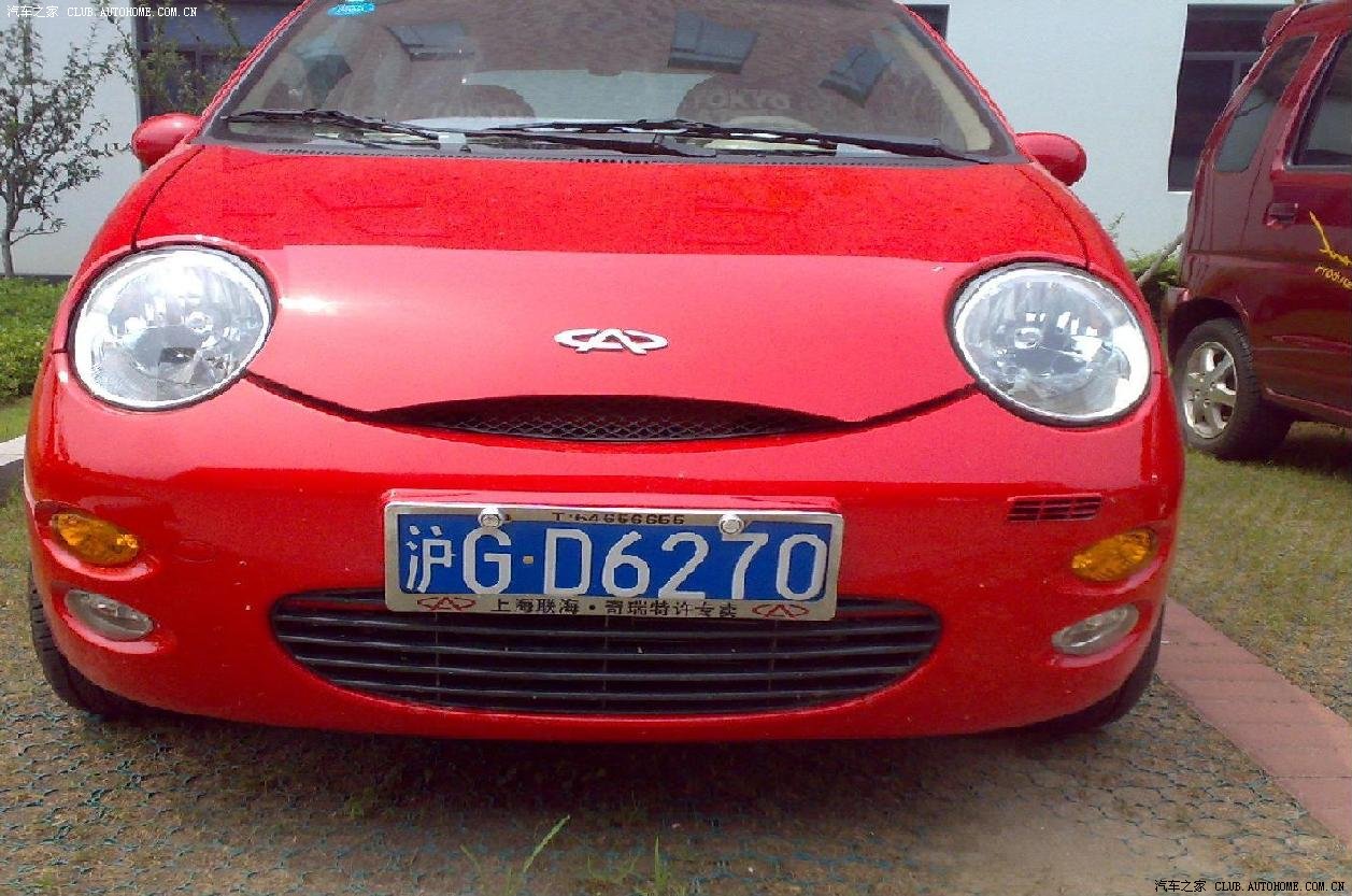 为拉风专门上了沪牌的红色小qq