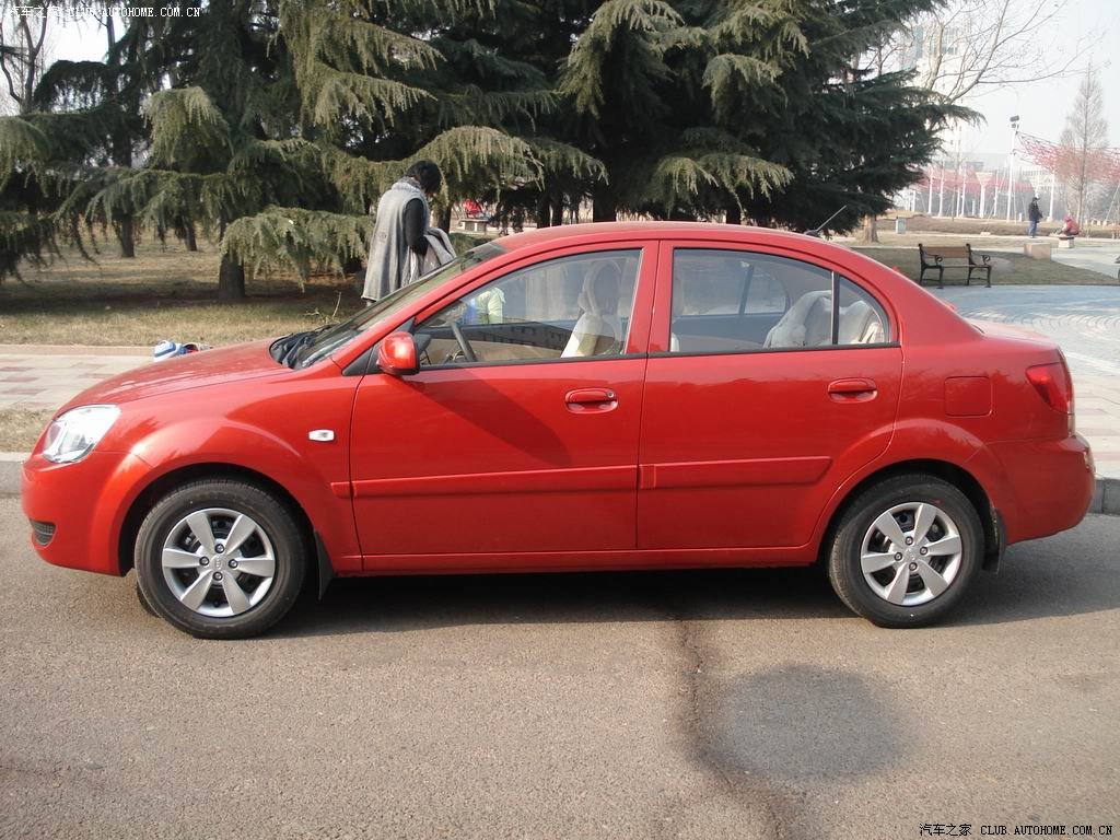 起亚rio浪漫红1.4gl,上图作业